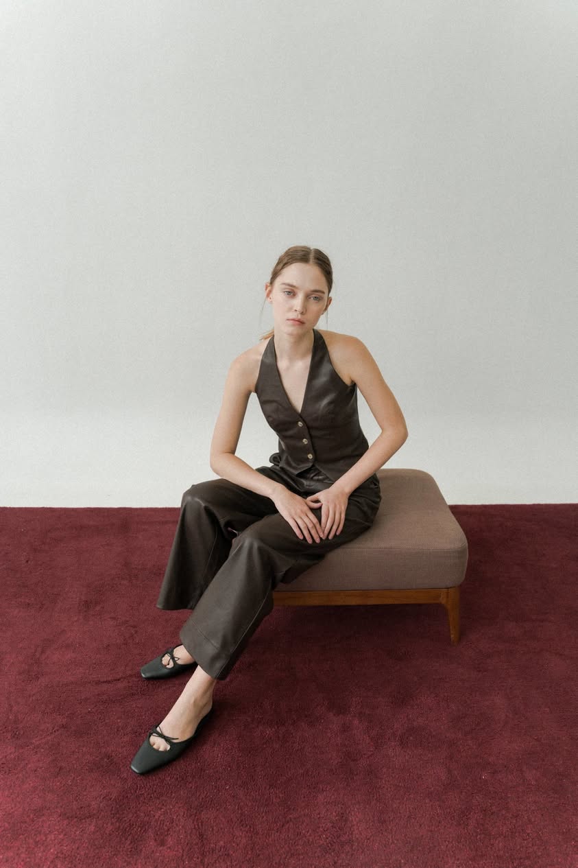 Model showcasing a fluid silhouette from the Spring 26 Studios Edition