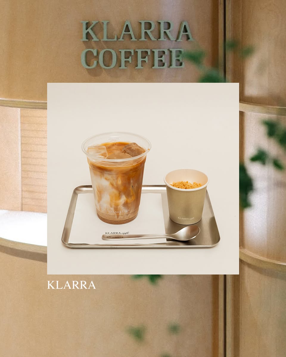 Interior view of a minimalist and modern coffee shop.