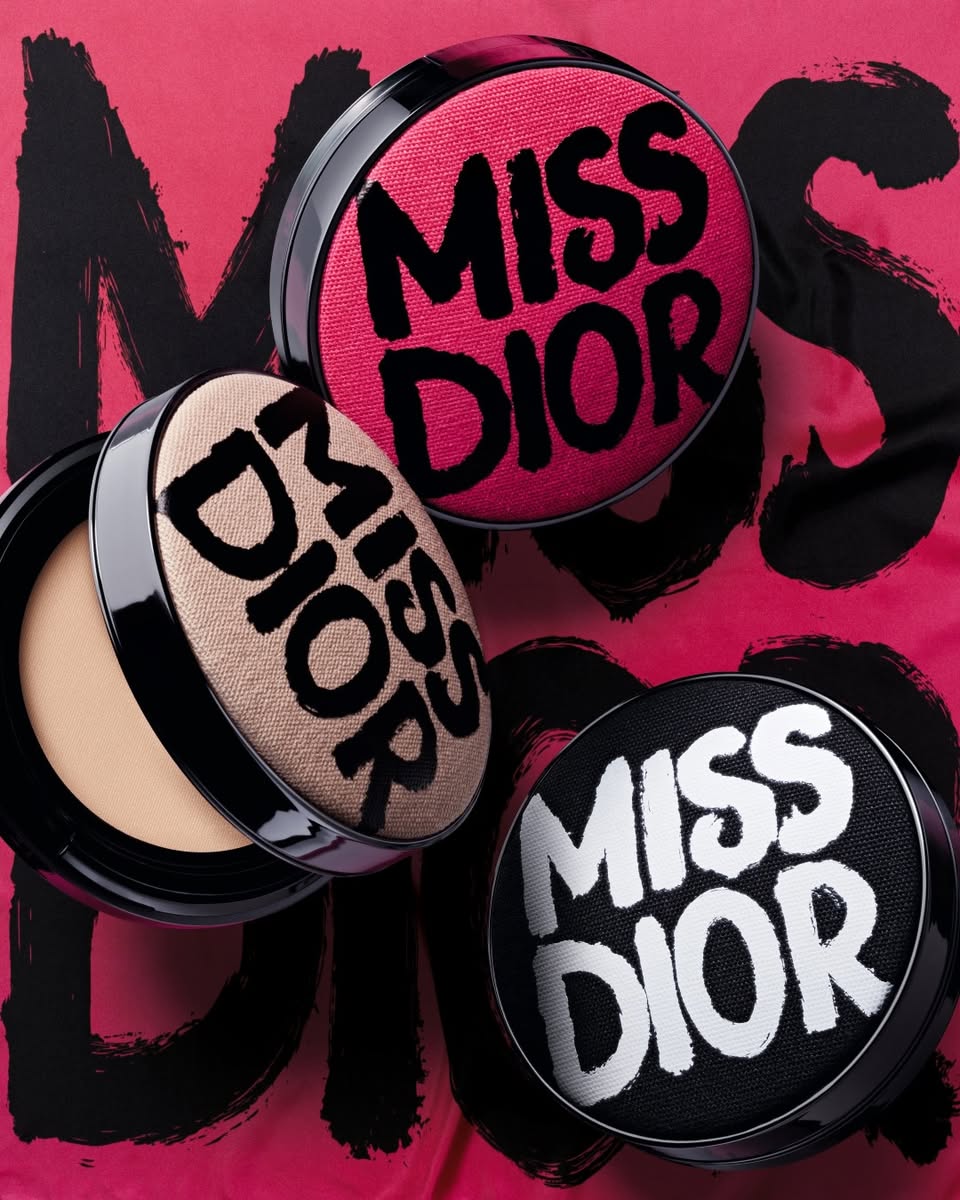 A model showcasing a Miss Dior inspired makeup look with prominent pink tones