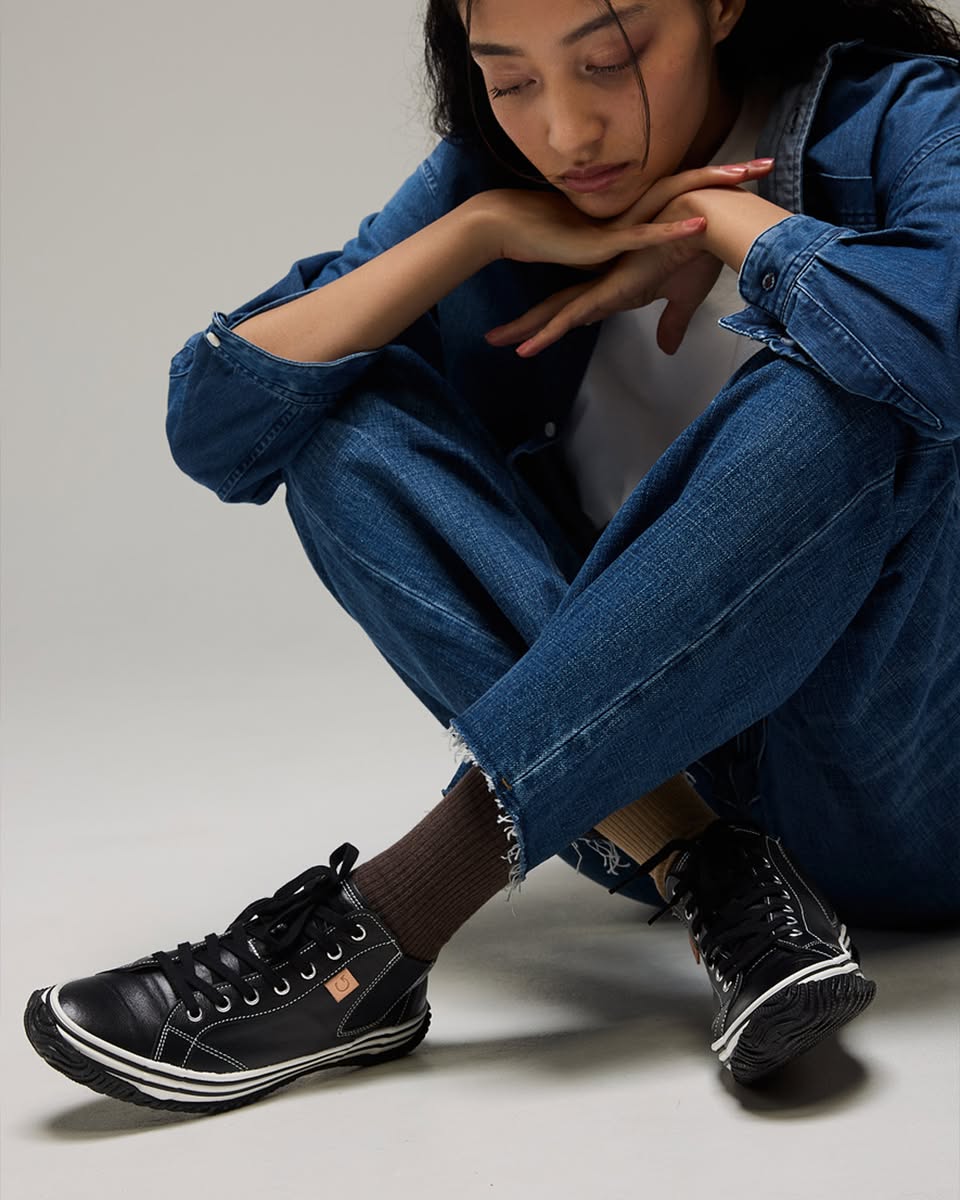 SPINGLE black high-top sneakers styled with denim