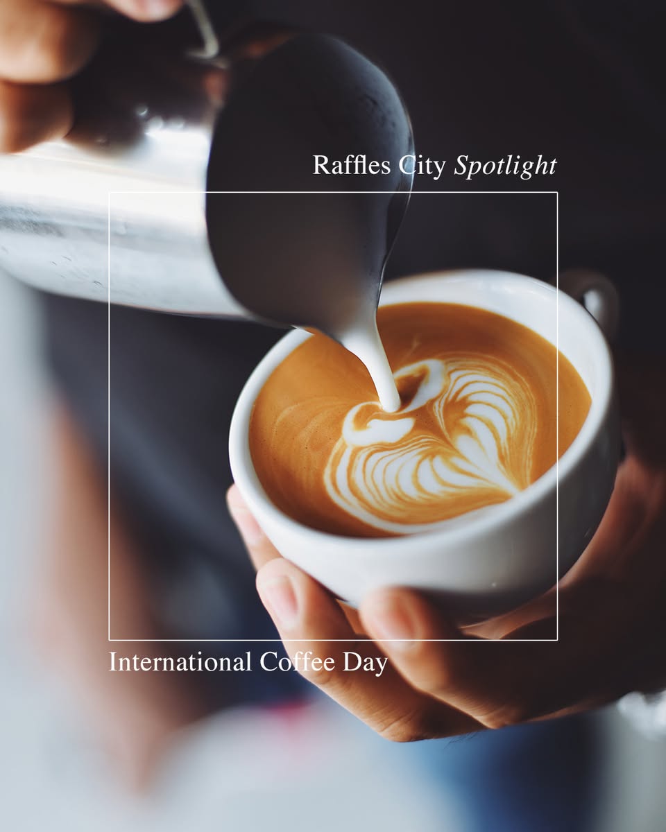A barista artfully preparing a coffee drink in a stylish setting.