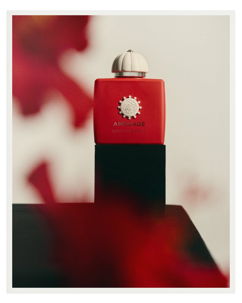 Amouage Love Is Scent fragrance in red packaging with white cap