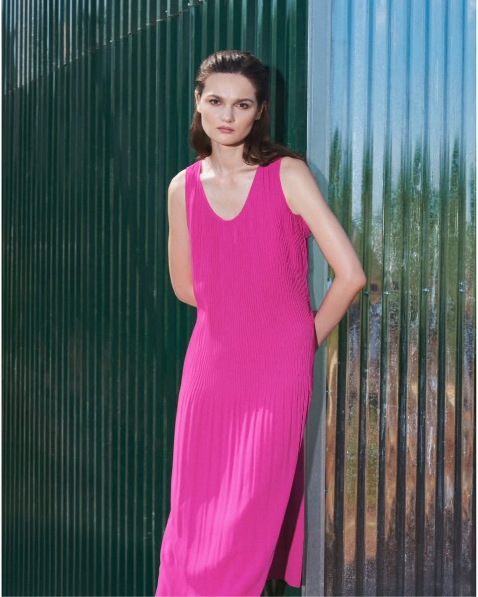 A model wearing a piece from the GINLEE AW25 collection, showcasing its understated design.