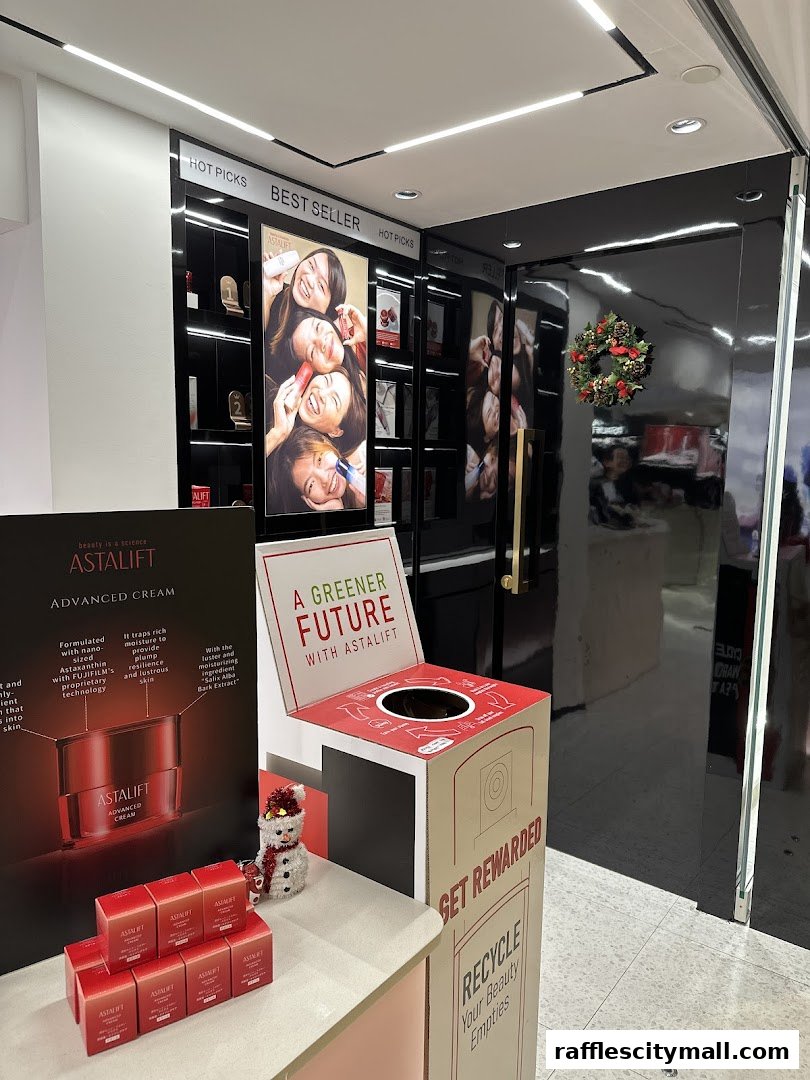Astalift shop interior with product displays, promotional posters, and a recycling bin.