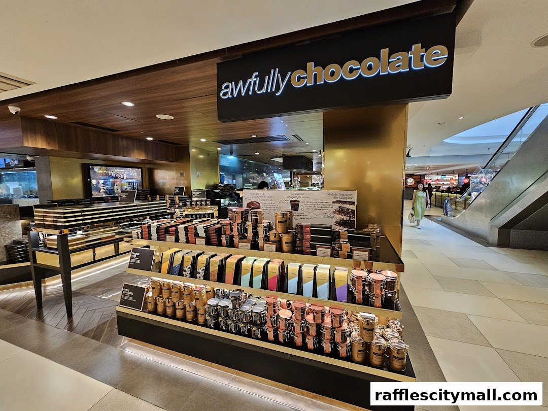 Awfully Chocolate shop interior showcasing a wide selection of chocolate products and cakes.