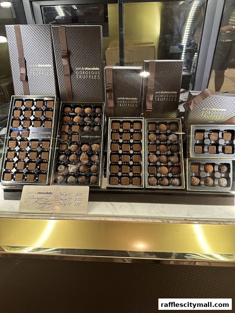 A display of Awfully Chocolate's gorgeous truffle boxes and assorted truffle trays.