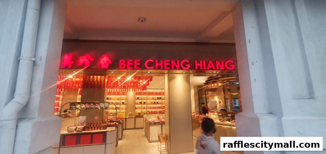 The brightly lit entrance of Bee Cheng Hiang, a shop selling traditional snacks.