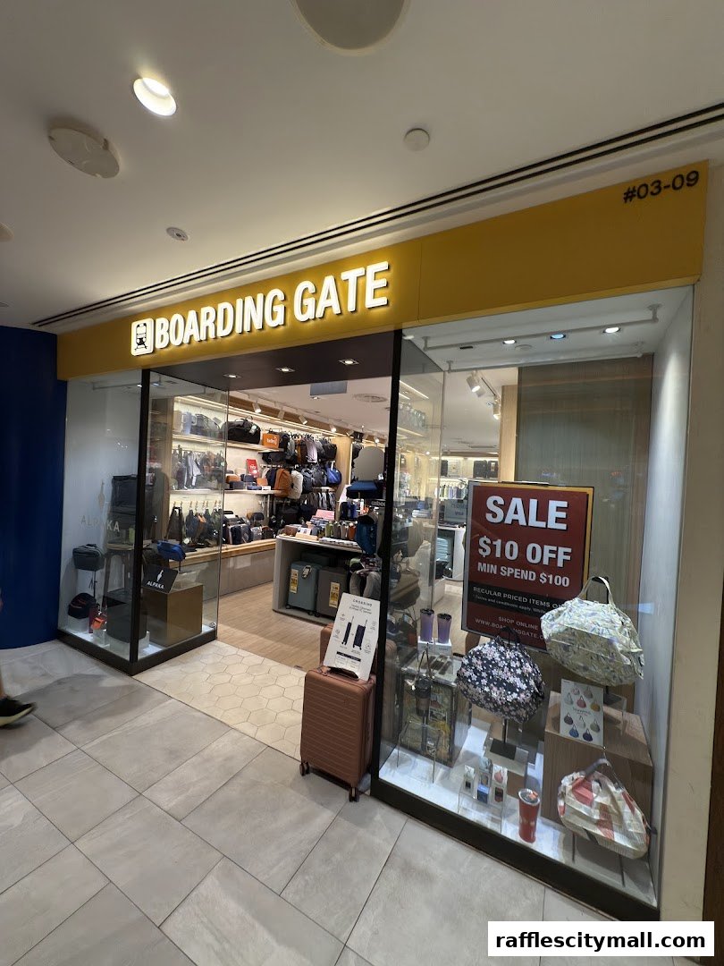 The exterior of the Boarding Gate shop, showcasing luggage and travel accessories with a sale sign.