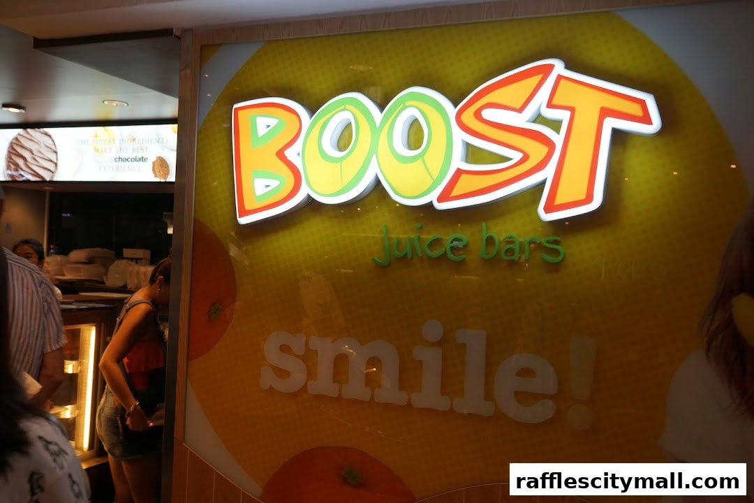 The Boost Juice bar logo and interior with customers.