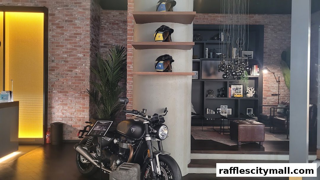 Interior of a Breitling Boutique with a motorcycle, helmets, and stylish decor.