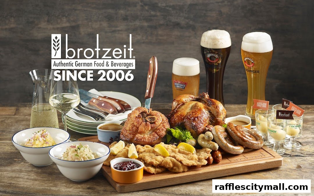 A spread of authentic German food and beverages, including a roasted chicken, pork knuckle, sausages, schnitzel, and beers.