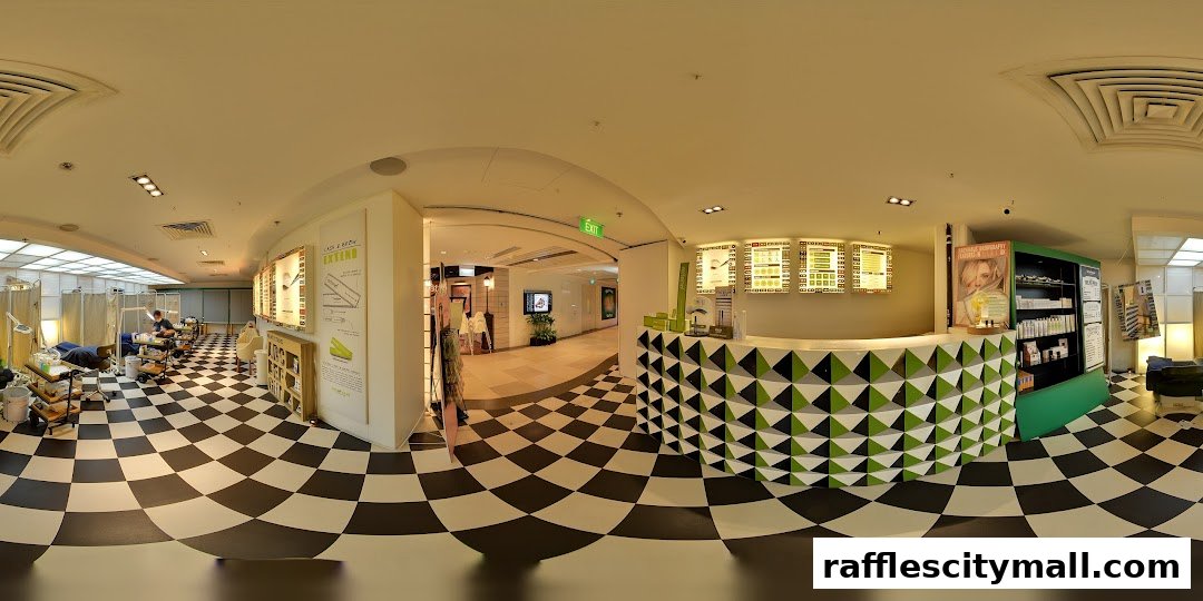 Interior of Browhaus Raffles City, showcasing treatment beds, a reception counter, and product displays.