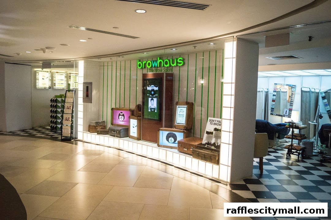 The Browhaus Raffles City shop front with green stripes and display screens.