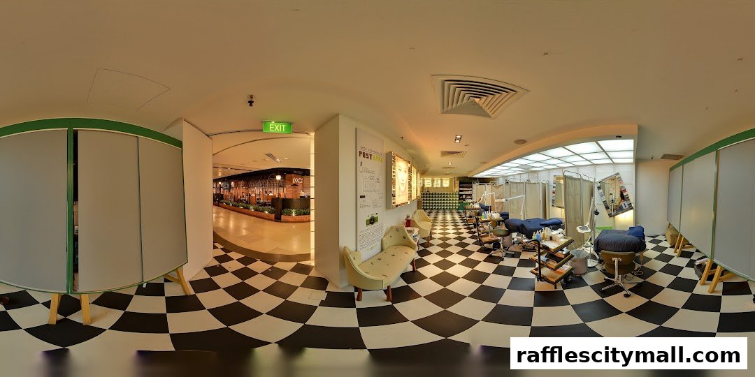 Interior view of a beauty salon with treatment beds, mirrors, and a distinctive black and white checkered floor.