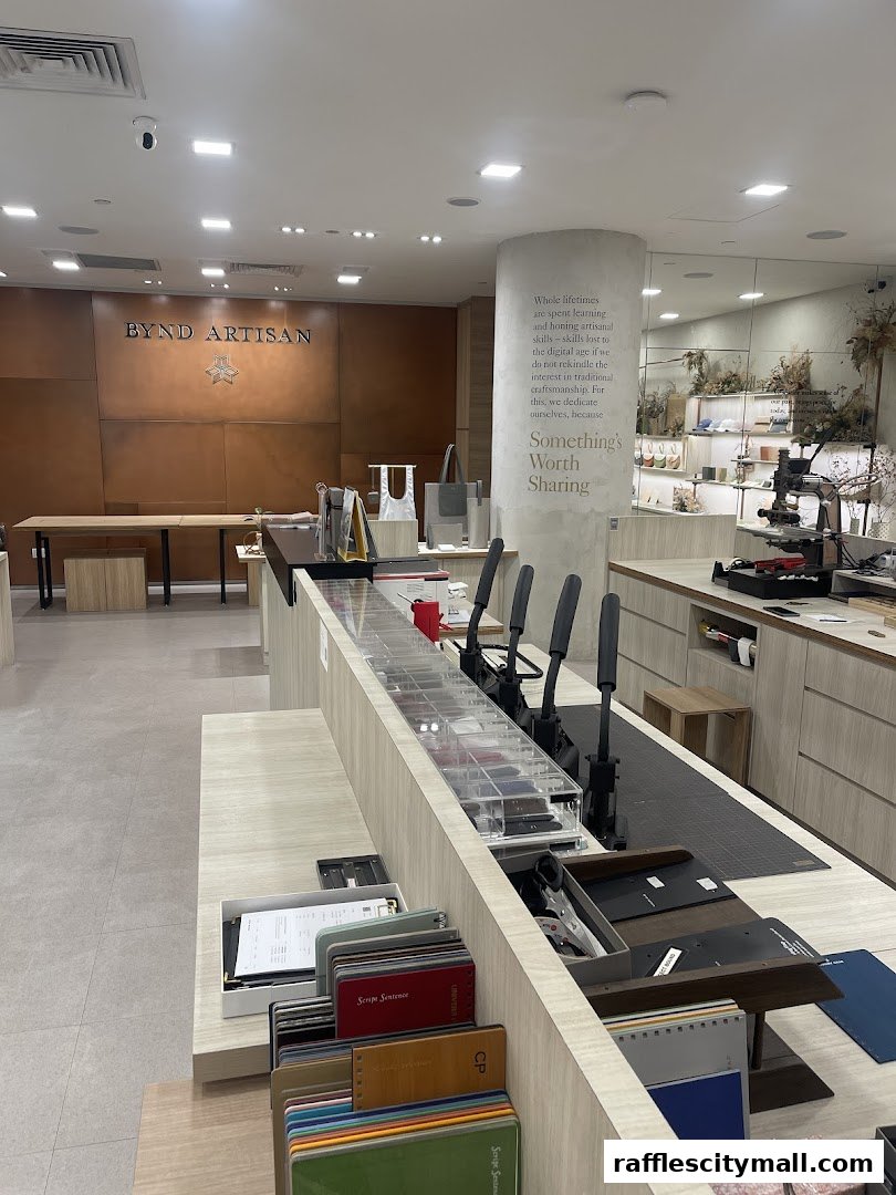 Interior of a Bynd Artisan store showcasing leather samples and crafting tools.