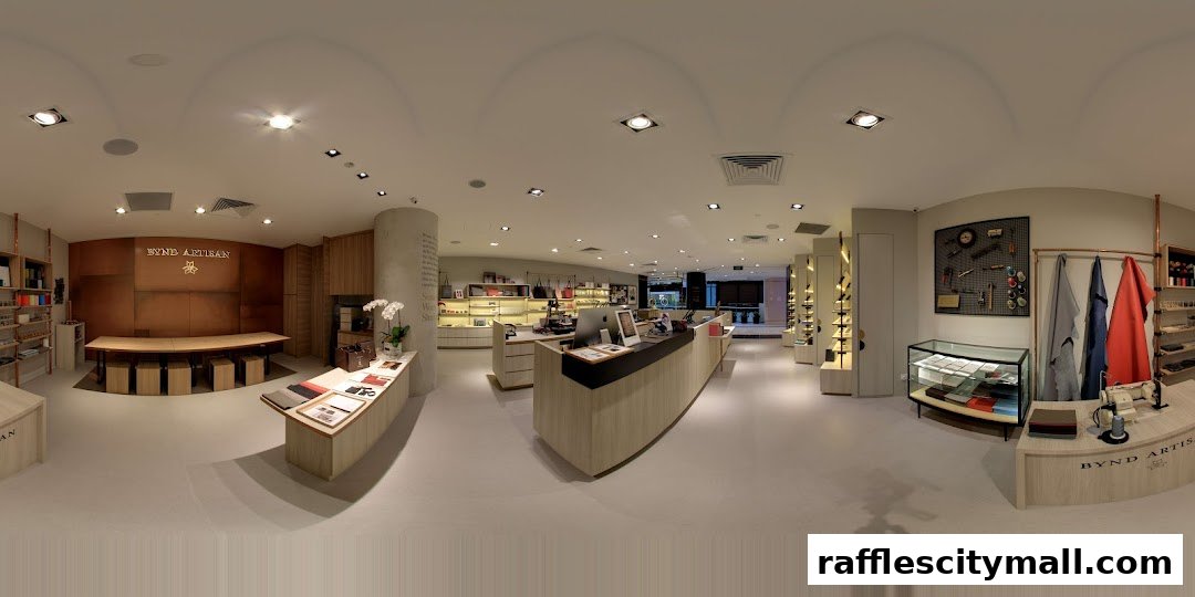 Interior view of a well-lit atelier showcasing leather goods and crafting tools.