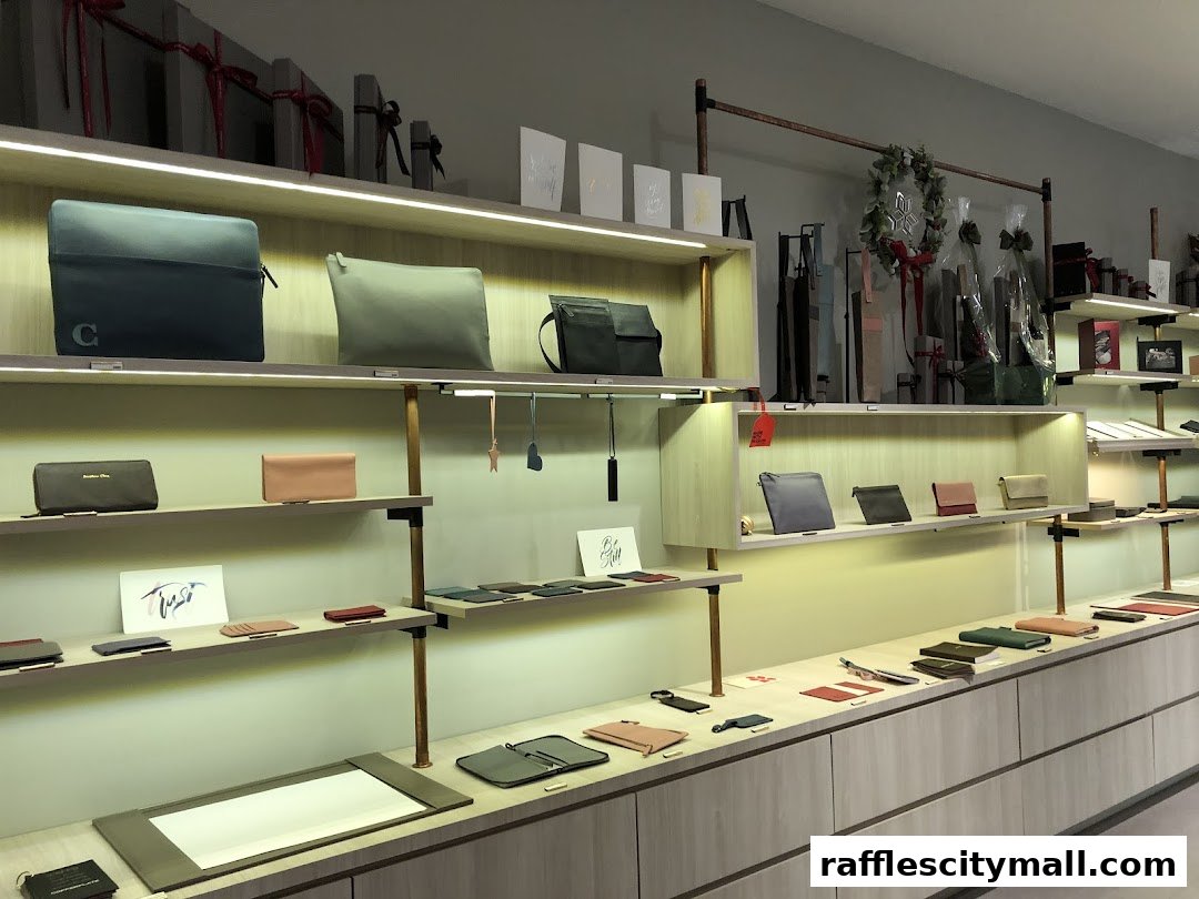 Interior view of a shop displaying various leather goods and accessories on shelves.