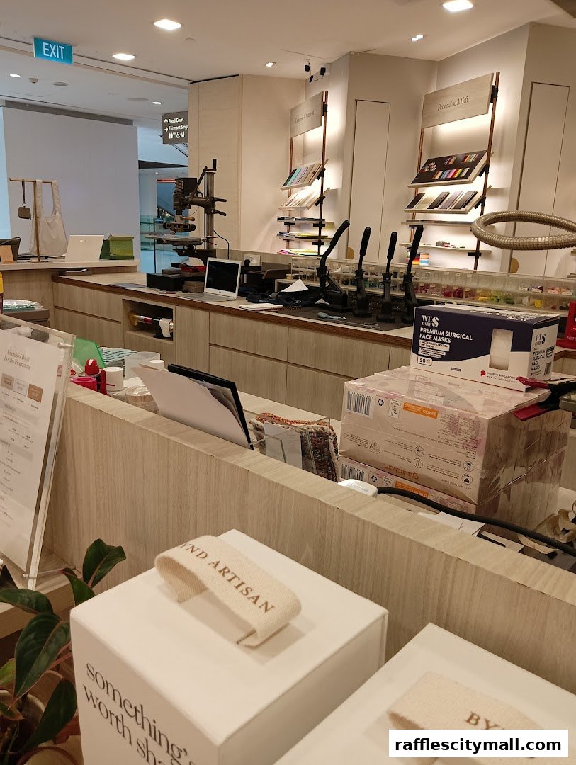 Interior view of a shop with display shelves, a counter, and products like face masks.
