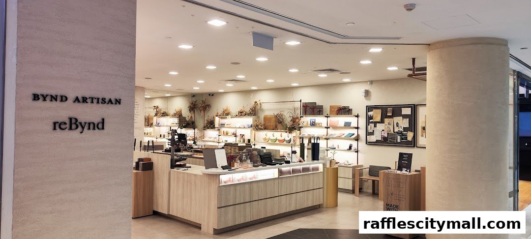 Interior view of a well-lit retail store with shelves displaying various products and a central counter.