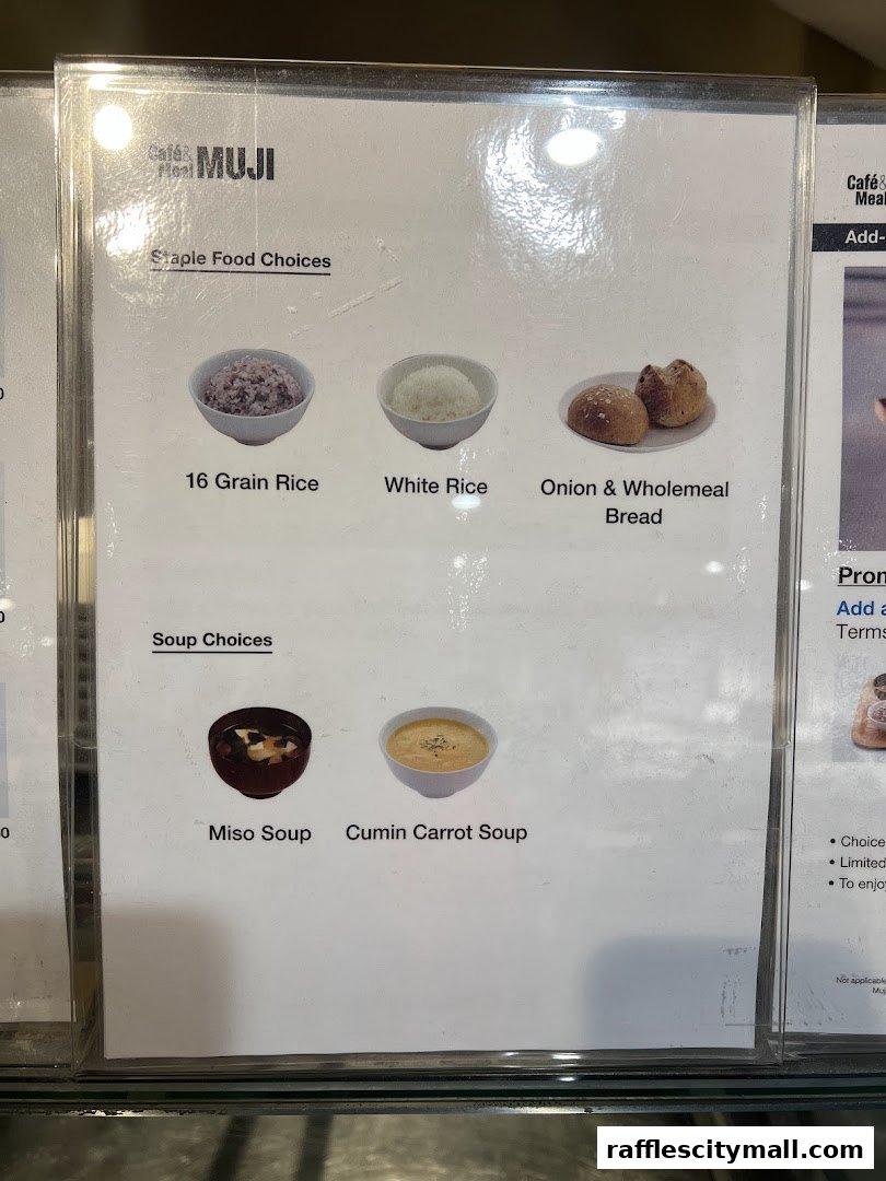 A menu display showing staple food and soup choices at CafeMeal MUJI.