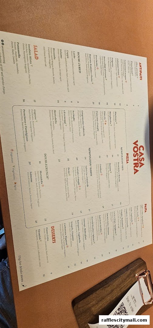 A menu from Casa Vostra restaurant featuring pizzas, pastas, antipasti, salads, and desserts.