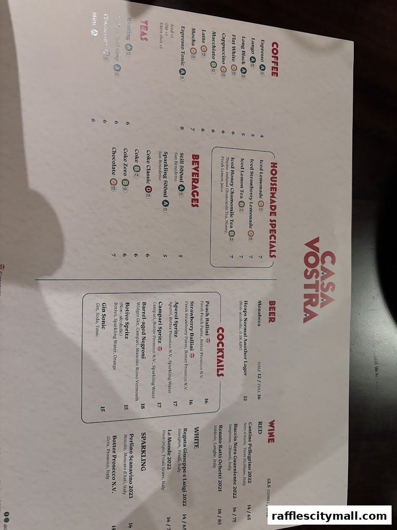 A menu from Casa Vostra featuring coffees, housemade specials, beverages, cocktails, beer, and wine.