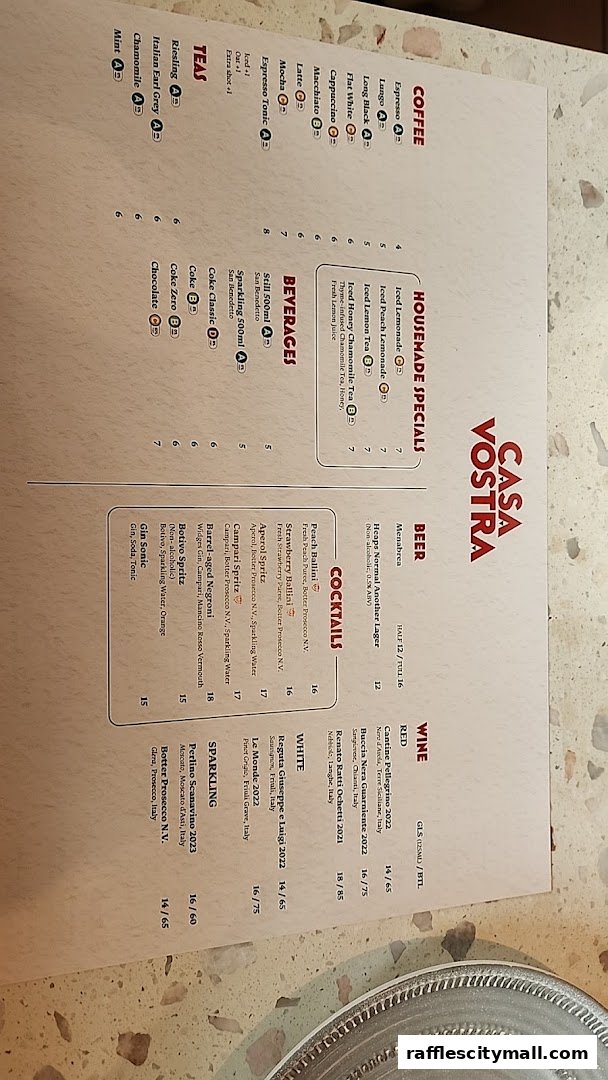 A menu from Casa Vostra featuring coffee, teas, beverages, beer, wine, and cocktails.