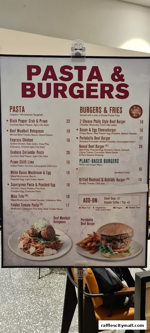 A menu board displaying pasta and burger options with accompanying images.