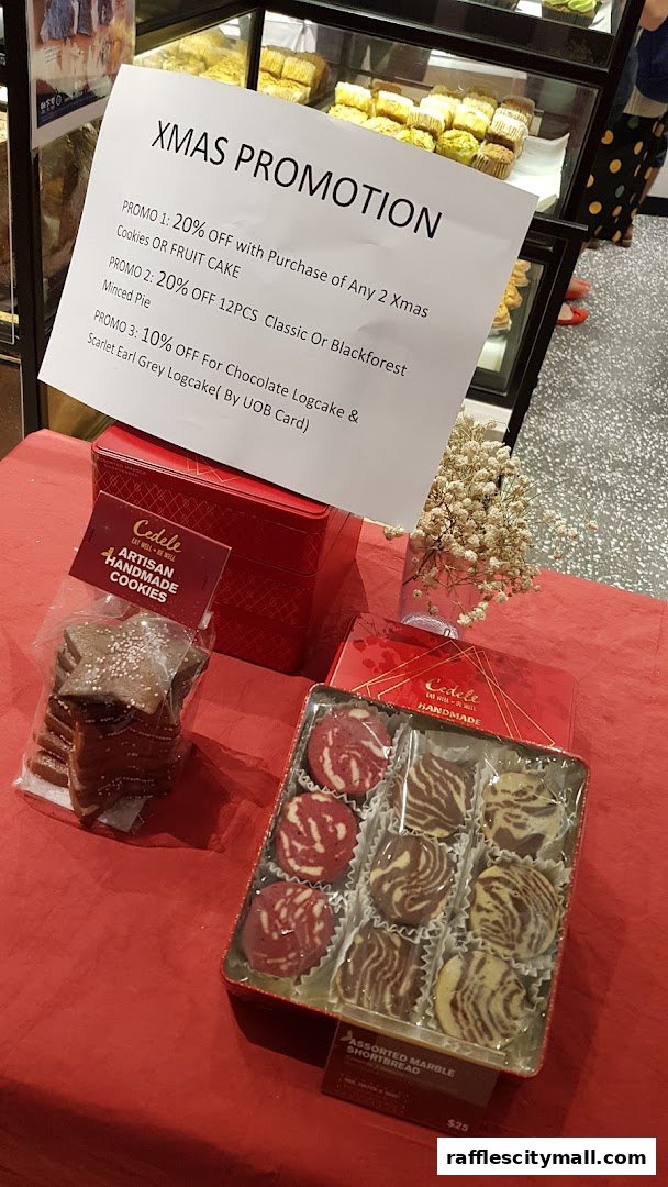 Cedele Bakery Kitchen displays Christmas promotions and assorted cookies and shortbread.