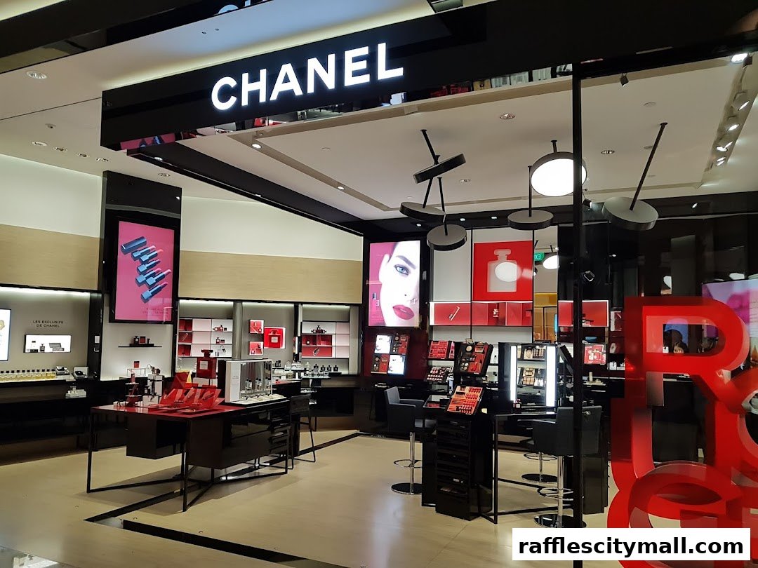 Interior view of a brightly lit Chanel beauty store showcasing makeup and fragrances.