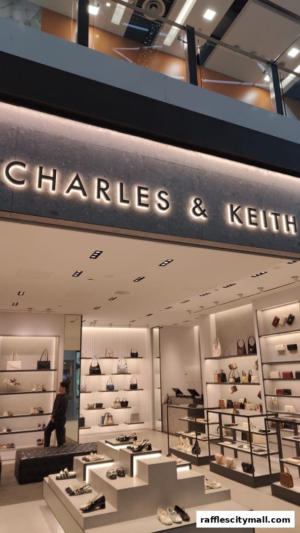 Interior view of a Charles & Keith store showcasing handbags and shoes on display shelves.