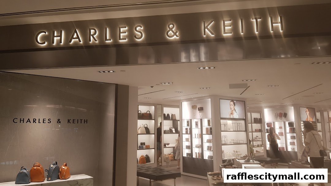 Interior view of a Charles & Keith store showcasing handbags and shoes on display.
