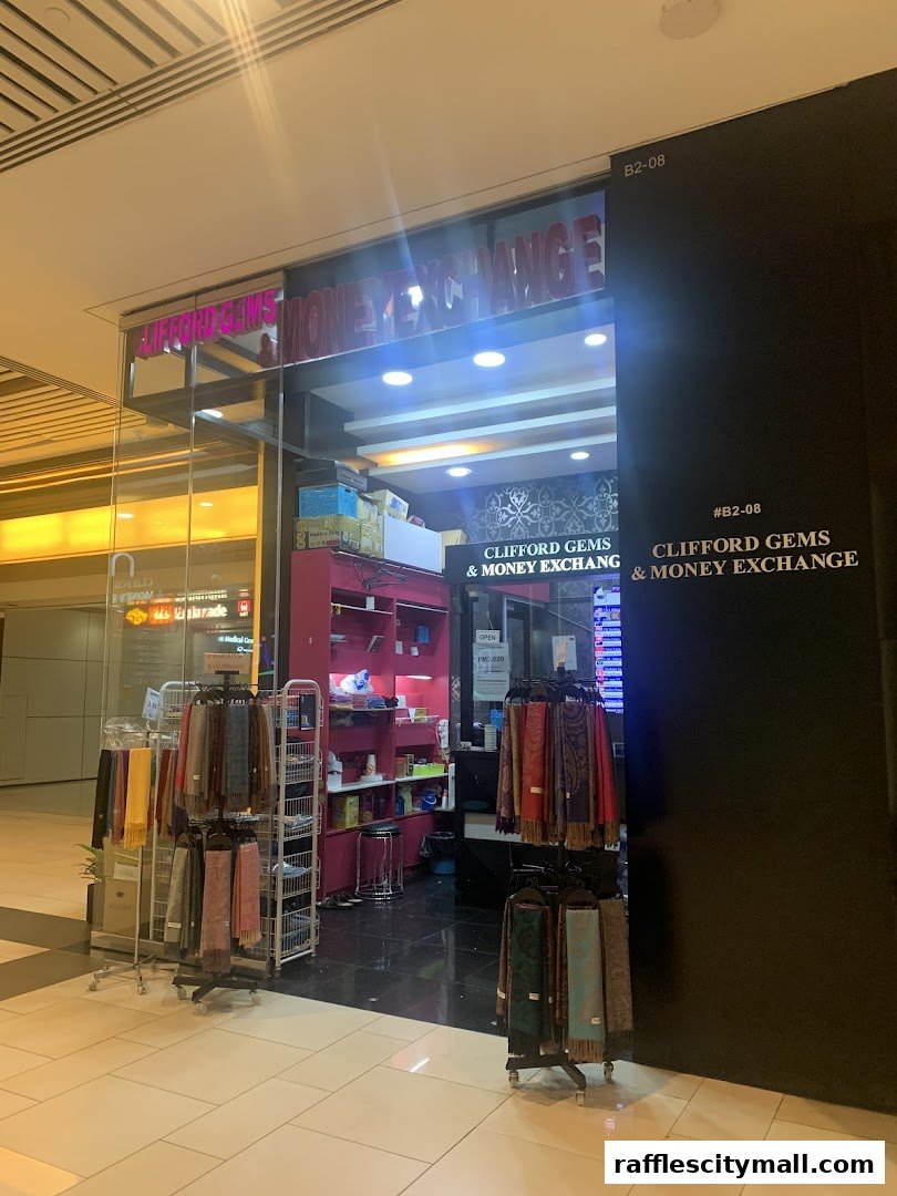 The exterior of Clifford Gems & Money Exchange shop, displaying scarves and currency exchange services.