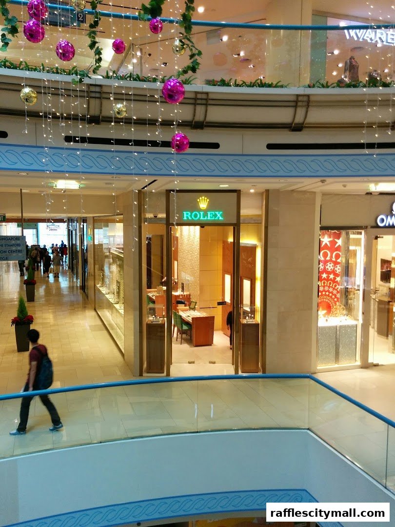 The entrance of a luxurious Rolex watch store in a shopping mall.