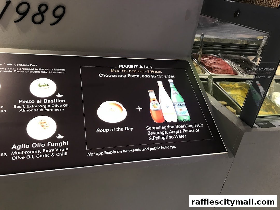 A menu board showcasing pasta dishes and a set meal offer with drinks.