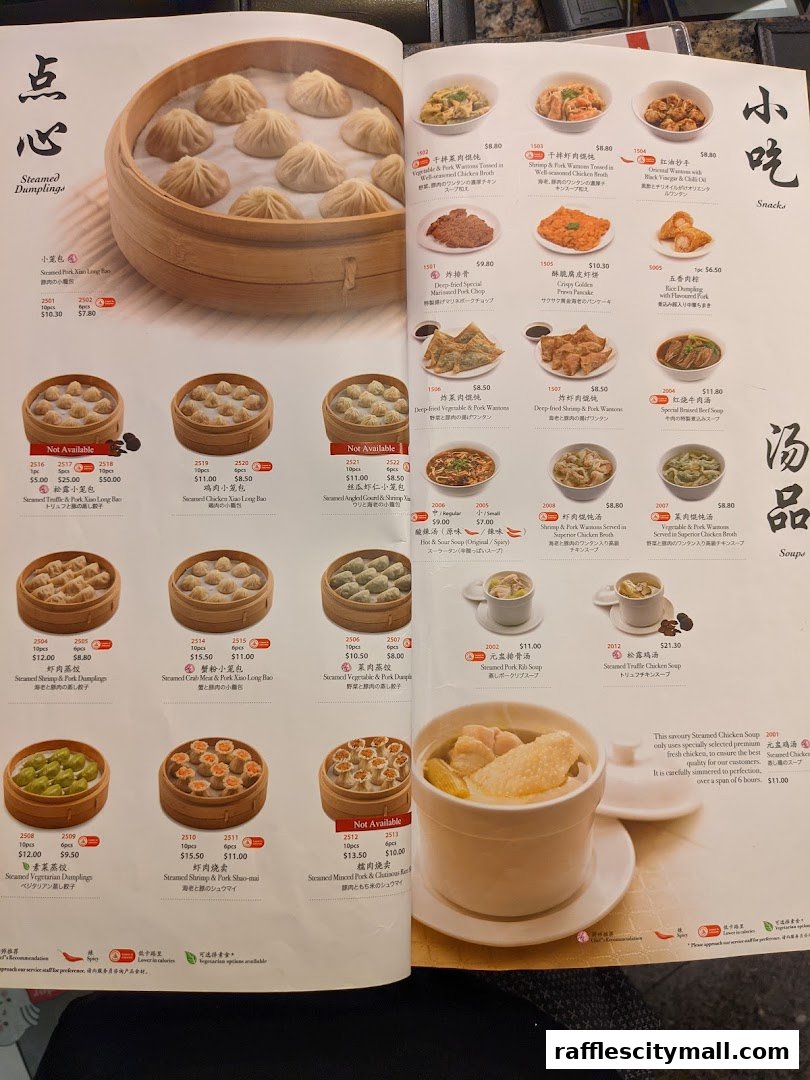 A menu from Din Tai Fung featuring various steamed dumplings and soups.