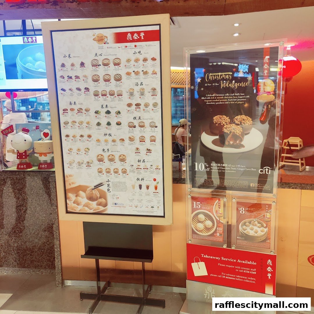 A menu board displaying various dim sum dishes and promotional posters for Christmas indulgence.