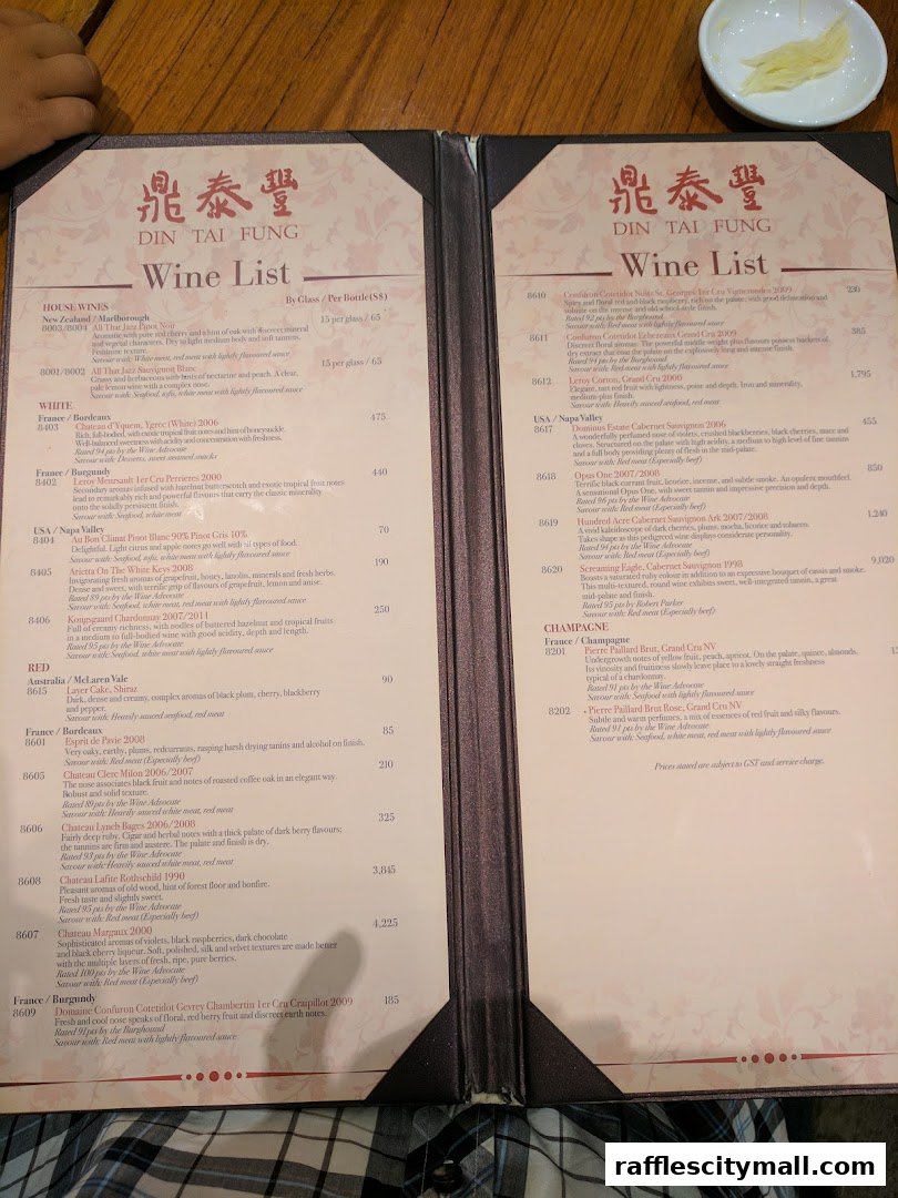 A wine list from Din Tai Fung featuring various wines with descriptions and prices.