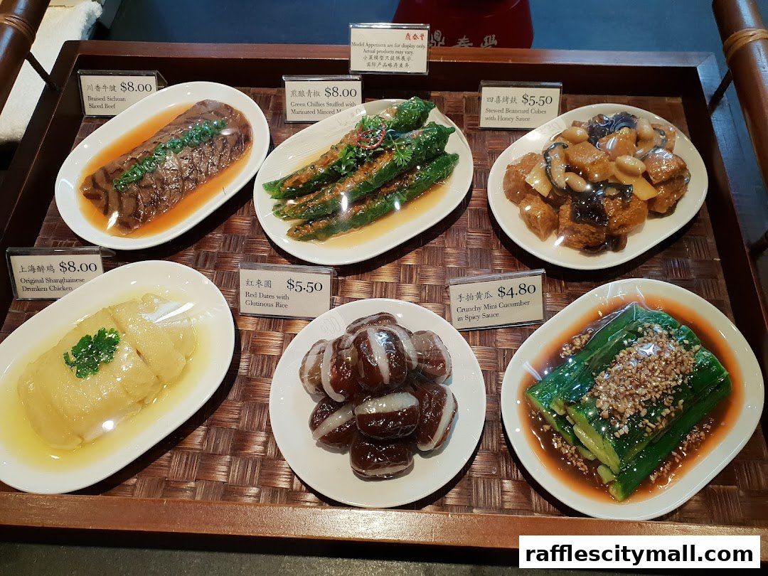 A display of six different Chinese food appetizers with their names and prices.