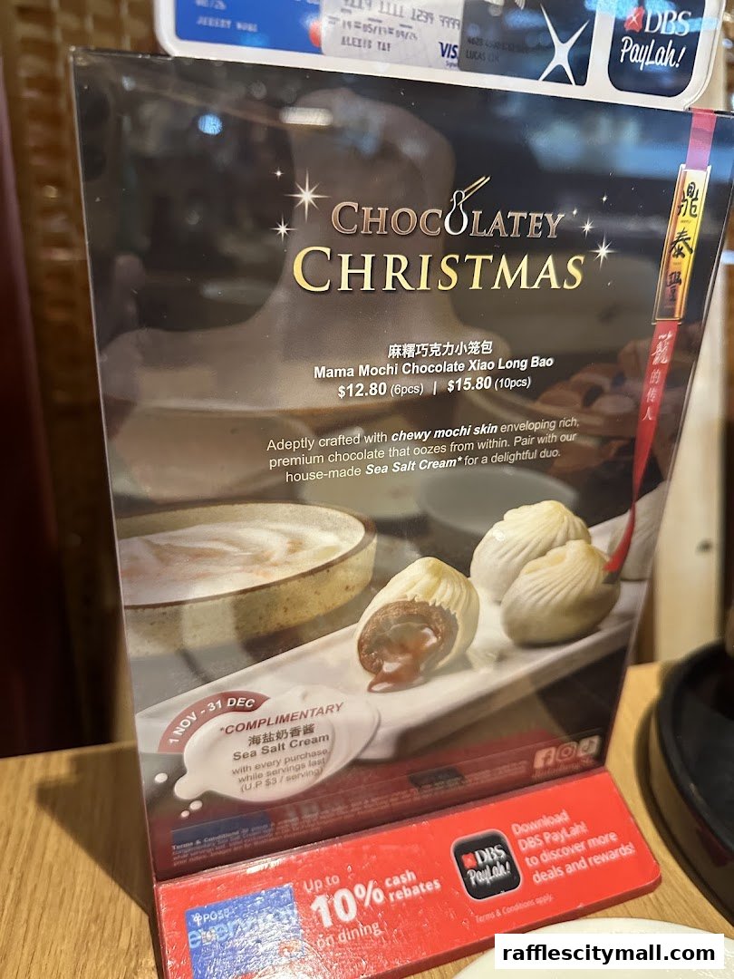 A menu featuring Chocolatey Christmas Mama Mochi Xiao Long Bao with a complimentary Sea Salt Cream offer.
