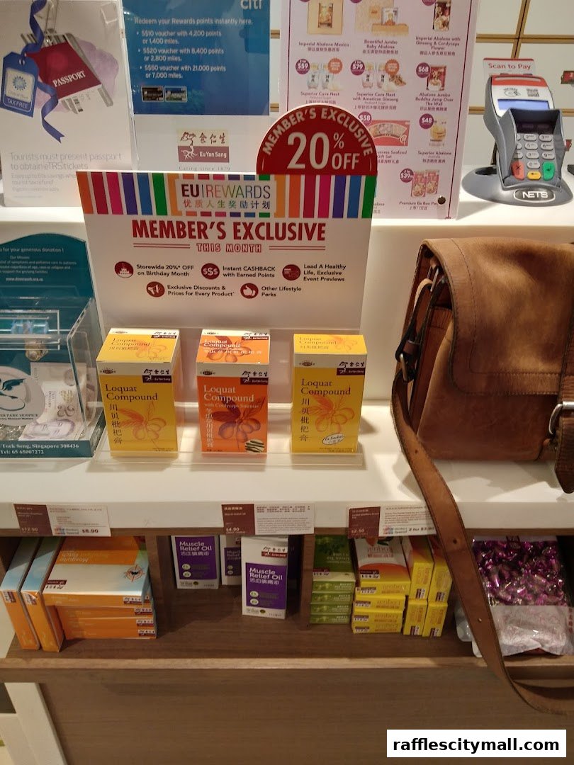 Eu Yan Sang shop display featuring member exclusive offers and various health products.