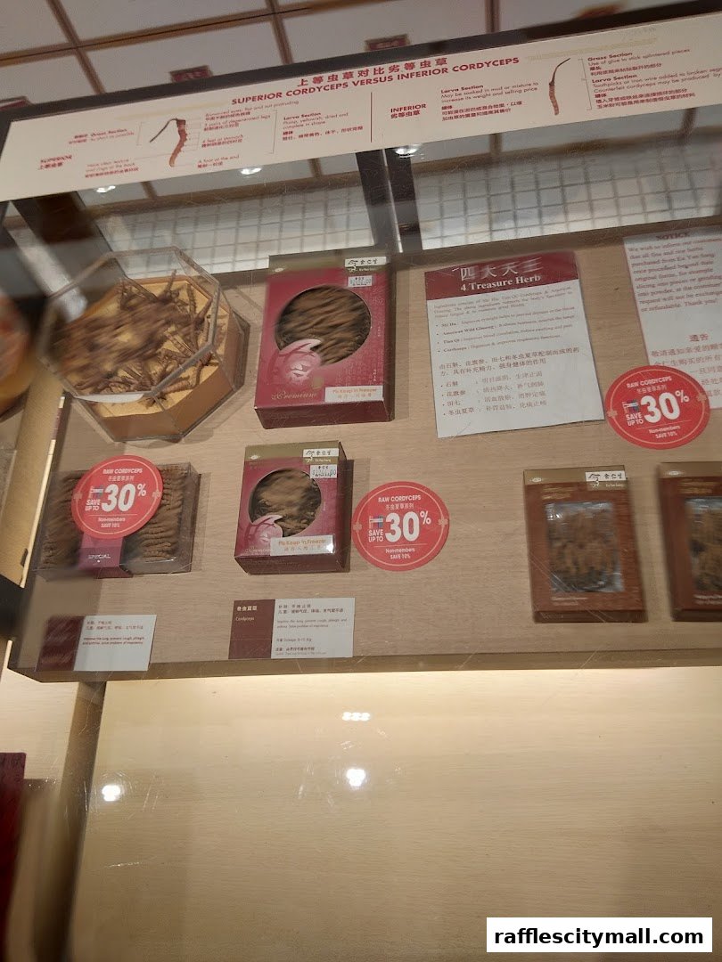Display of various cordyceps products with promotional signage.