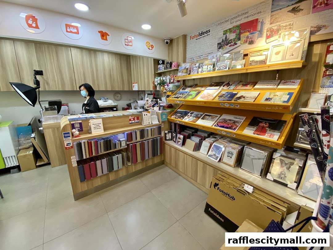 Interior of a FotoHub store showcasing photo albums, frames, and printing services.