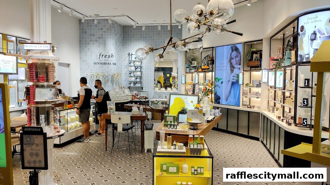 Interior view of a brightly lit Fresh Sensorial Bar with skincare products and displays.
