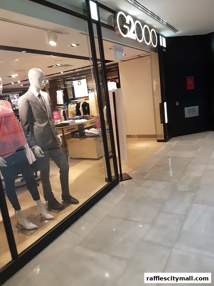 G2000 store entrance with mannequins displaying formal wear in the window.