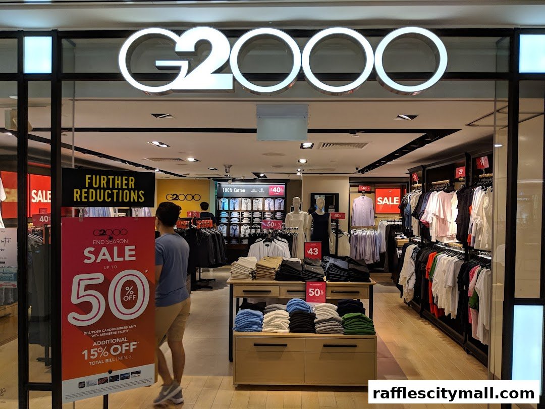 The G2000 shop entrance with a sale sign and clothing displays inside.
