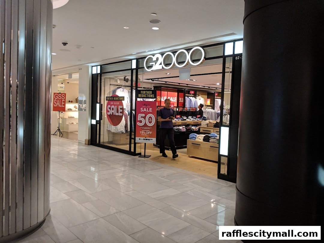 The G2000 shop entrance with sale signs and clothing displays inside.