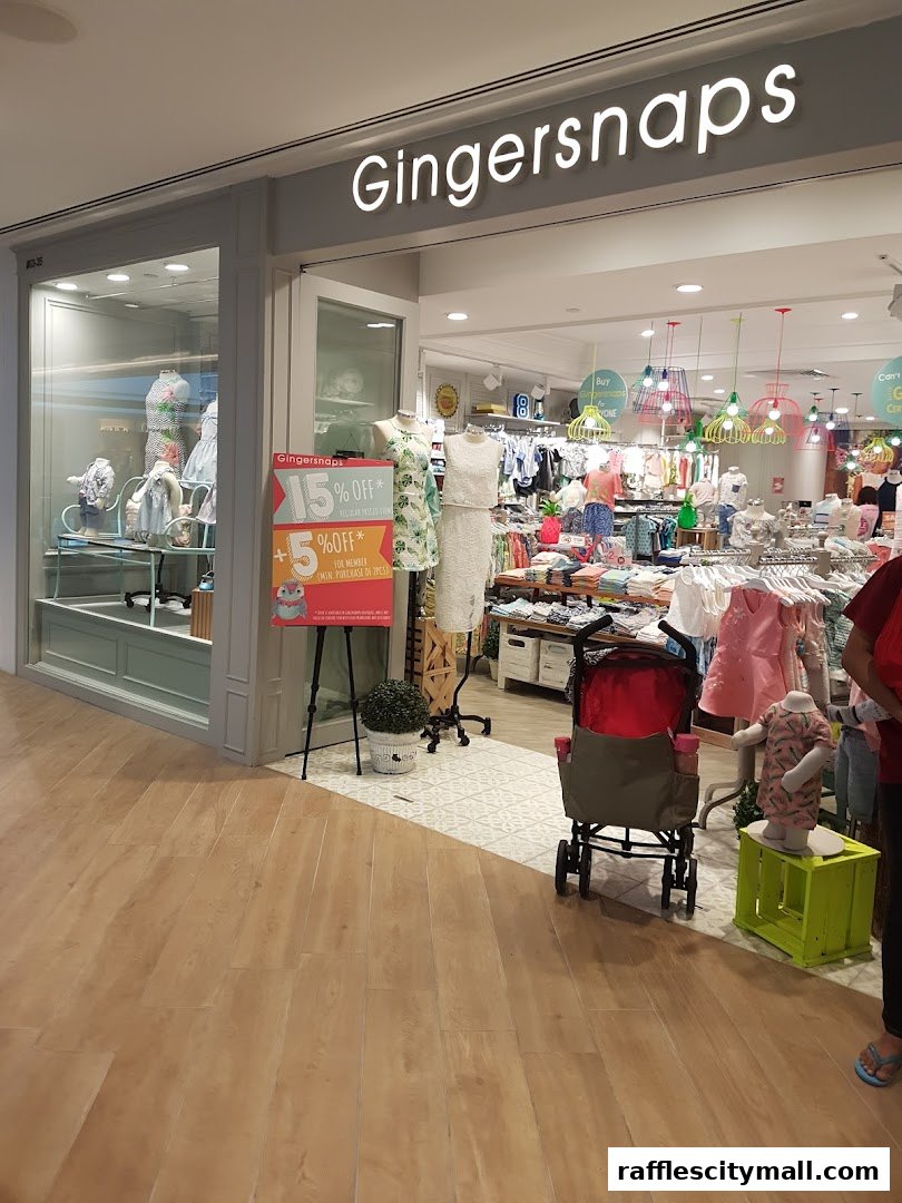 The Gingersnaps store front displays children's clothing and a promotional sign.