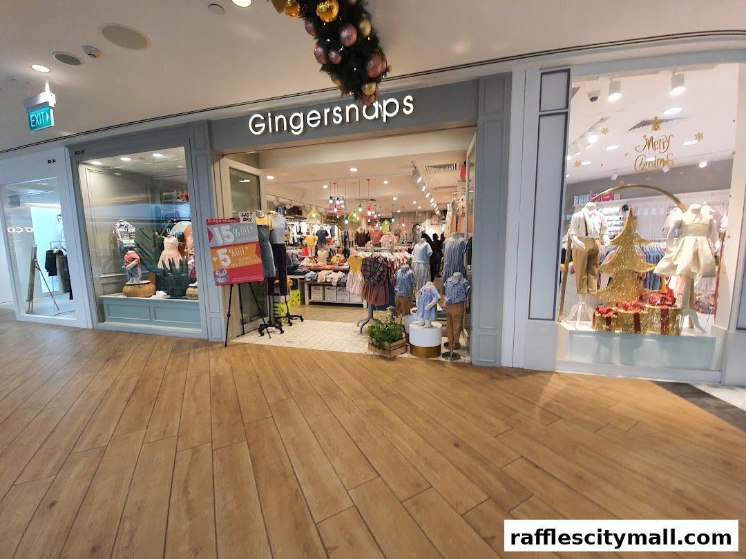 Gingersnaps children's clothing store with festive Christmas window displays and sale signage.