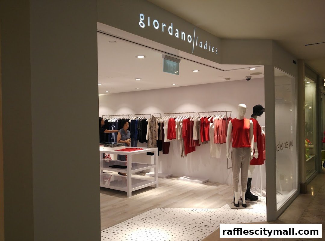 The entrance of Giordano Ladies shop with mannequins and clothing displays.